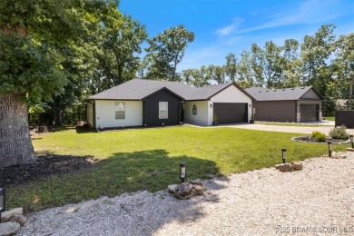 Enjoy a crisp morning sipping your morning coffee and watching on Tan-Tar-A Golf Club in Missouri - for sale on GolfHomes.com, golf home, golf lot