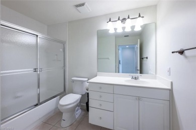 Experience the best of Naples living in this beautifully on Pelican Marsh Golf Club in Florida - for sale on GolfHomes.com, golf home, golf lot