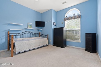 Discover this inviting 3-bedroom, 2-bathroom home nestled in the on Sandpiper Bay Golf and Country Club in North Carolina - for sale on GolfHomes.com, golf home, golf lot