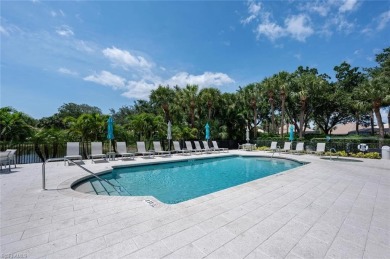 Experience the best of Naples living in this beautifully on Pelican Marsh Golf Club in Florida - for sale on GolfHomes.com, golf home, golf lot