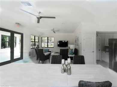 Experience the best of Naples living in this beautifully on Pelican Marsh Golf Club in Florida - for sale on GolfHomes.com, golf home, golf lot