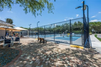 Experience the best of Naples living in this beautifully on Pelican Marsh Golf Club in Florida - for sale on GolfHomes.com, golf home, golf lot