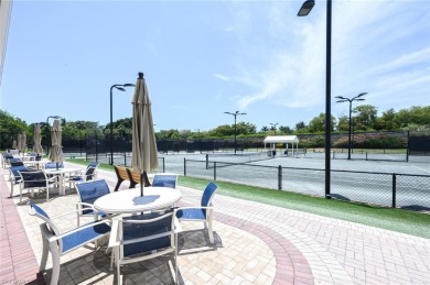 Experience the best of Naples living in this beautifully on Pelican Marsh Golf Club in Florida - for sale on GolfHomes.com, golf home, golf lot