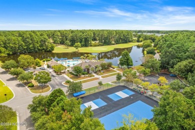 Discover this inviting 3-bedroom, 2-bathroom home nestled in the on Sandpiper Bay Golf and Country Club in North Carolina - for sale on GolfHomes.com, golf home, golf lot