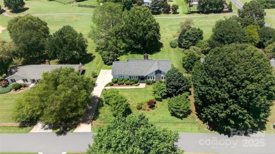 Meticulously maintained one-owner home with golf course frontage on Mallard Head Country Club in North Carolina - for sale on GolfHomes.com, golf home, golf lot
