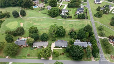 Meticulously maintained one-owner home with golf course frontage on Mallard Head Country Club in North Carolina - for sale on GolfHomes.com, golf home, golf lot