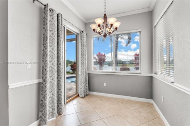 BEAUTIFUL PALM ISLES ESTATE HOME W/ GOLF AND LAKE VIEW. This on Keys Gate Golf Club in Florida - for sale on GolfHomes.com, golf home, golf lot