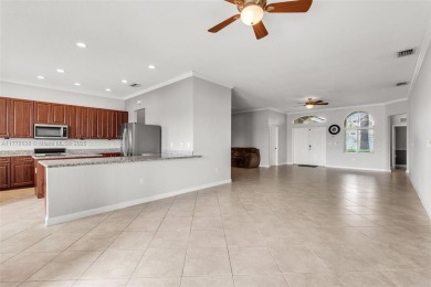BEAUTIFUL PALM ISLES ESTATE HOME W/ GOLF AND LAKE VIEW. This on Keys Gate Golf Club in Florida - for sale on GolfHomes.com, golf home, golf lot