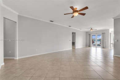 BEAUTIFUL PALM ISLES ESTATE HOME W/ GOLF AND LAKE VIEW. This on Keys Gate Golf Club in Florida - for sale on GolfHomes.com, golf home, golf lot