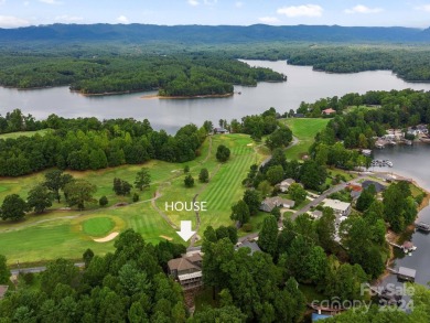 Embrace the ultimate lakefront lifestyle in this extraordinary on Marion Lake Club in North Carolina - for sale on GolfHomes.com, golf home, golf lot