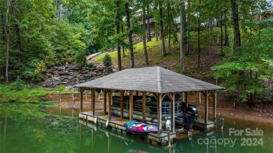 Embrace the ultimate lakefront lifestyle in this extraordinary on Marion Lake Club in North Carolina - for sale on GolfHomes.com, golf home, golf lot