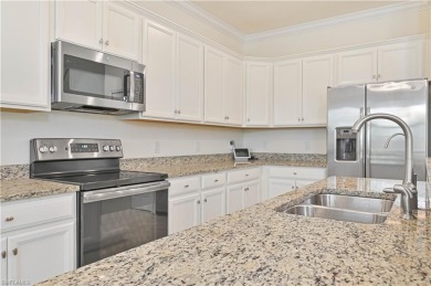 Enjoy resort-style living in this stunning Almofi floorplan home on Gateway Golf and Country Club in Florida - for sale on GolfHomes.com, golf home, golf lot