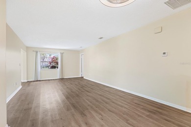 Located in the gated and guard-attended Kings Point community on Falcon Watch Golf Club in Florida - for sale on GolfHomes.com, golf home, golf lot