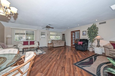 Welcome home to the highly desirable Sun City community! This 2 on Sun City Lakes West and East in Arizona - for sale on GolfHomes.com, golf home, golf lot