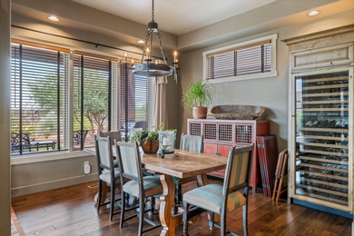 This elegant home sits on the Entrada Fairway with large windows on Entrada at Snow Canyon in Utah - for sale on GolfHomes.com, golf home, golf lot