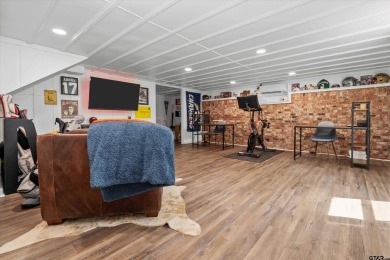 Located in the desirable Hideaway Lake Community, this charming on Hide-A-Way Lake Golf Course in Texas - for sale on GolfHomes.com, golf home, golf lot