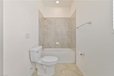 Enjoy resort-style living in this stunning Almofi floorplan home on Gateway Golf and Country Club in Florida - for sale on GolfHomes.com, golf home, golf lot