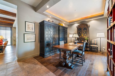 This elegant home sits on the Entrada Fairway with large windows on Entrada at Snow Canyon in Utah - for sale on GolfHomes.com, golf home, golf lot