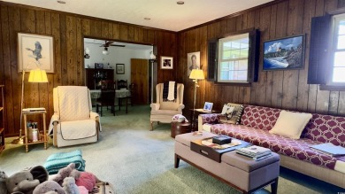 Step back in time with this lovingly maintained single-family on Pine Lakes Country Club in South Carolina - for sale on GolfHomes.com, golf home, golf lot