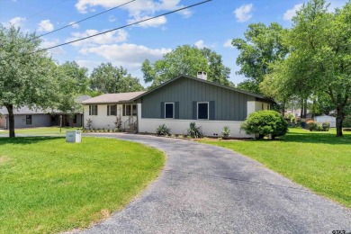 Located in the desirable Hideaway Lake Community, this charming on Hide-A-Way Lake Golf Course in Texas - for sale on GolfHomes.com, golf home, golf lot