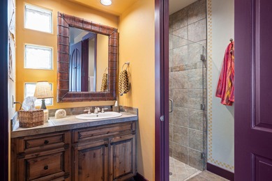 This elegant home sits on the Entrada Fairway with large windows on Entrada at Snow Canyon in Utah - for sale on GolfHomes.com, golf home, golf lot