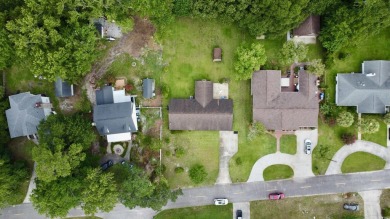 Step back in time with this lovingly maintained single-family on Pine Lakes Country Club in South Carolina - for sale on GolfHomes.com, golf home, golf lot