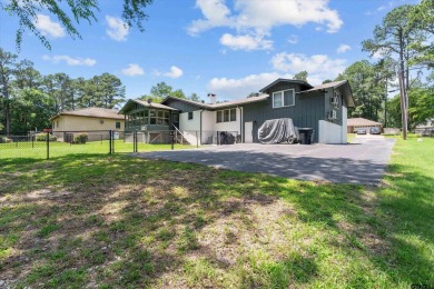 Located in the desirable Hideaway Lake Community, this charming on Hide-A-Way Lake Golf Course in Texas - for sale on GolfHomes.com, golf home, golf lot