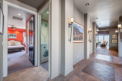 This elegant home sits on the Entrada Fairway with large windows on Entrada at Snow Canyon in Utah - for sale on GolfHomes.com, golf home, golf lot