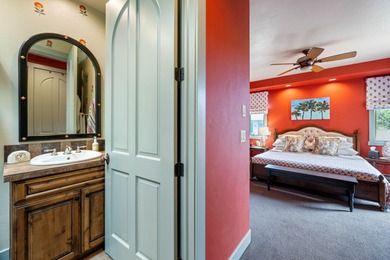 This elegant home sits on the Entrada Fairway with large windows on Entrada at Snow Canyon in Utah - for sale on GolfHomes.com, golf home, golf lot