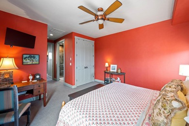 This elegant home sits on the Entrada Fairway with large windows on Entrada at Snow Canyon in Utah - for sale on GolfHomes.com, golf home, golf lot