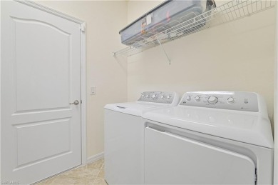 Enjoy resort-style living in this stunning Almofi floorplan home on Gateway Golf and Country Club in Florida - for sale on GolfHomes.com, golf home, golf lot