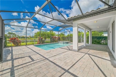 Enjoy resort-style living in this stunning Almofi floorplan home on Gateway Golf and Country Club in Florida - for sale on GolfHomes.com, golf home, golf lot