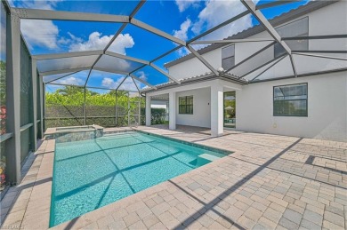 Enjoy resort-style living in this stunning Almofi floorplan home on Gateway Golf and Country Club in Florida - for sale on GolfHomes.com, golf home, golf lot