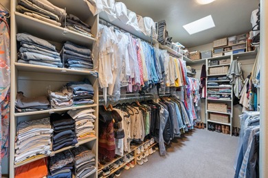 This elegant home sits on the Entrada Fairway with large windows on Entrada at Snow Canyon in Utah - for sale on GolfHomes.com, golf home, golf lot