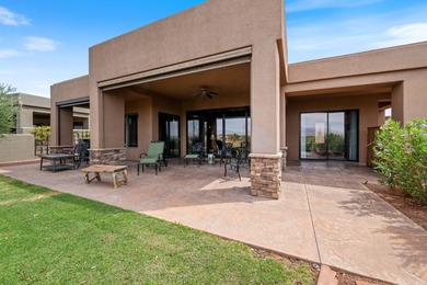 This elegant home sits on the Entrada Fairway with large windows on Entrada at Snow Canyon in Utah - for sale on GolfHomes.com, golf home, golf lot