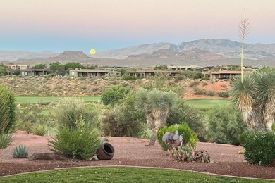 This elegant home sits on the Entrada Fairway with large windows on Entrada at Snow Canyon in Utah - for sale on GolfHomes.com, golf home, golf lot
