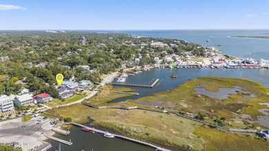 UNPARALLELED VISTAS OF RIVER, MARSH AND SEA -- With views on The Lakes Country Club in North Carolina - for sale on GolfHomes.com, golf home, golf lot