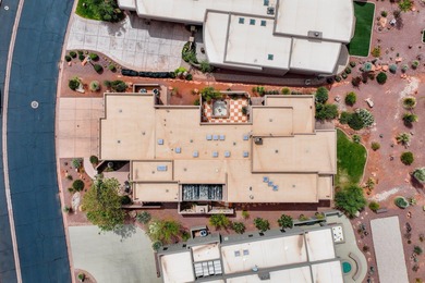 This elegant home sits on the Entrada Fairway with large windows on Entrada at Snow Canyon in Utah - for sale on GolfHomes.com, golf home, golf lot