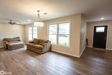 EASY LIVING, COMFORT,  COMMUNITY AWAIT AT THE TERRACES AT GLEN on Arrowhead Golf Course in Iowa - for sale on GolfHomes.com, golf home, golf lot