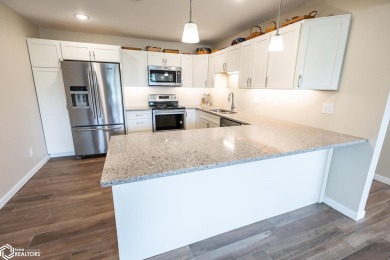 EASY LIVING, COMFORT,  COMMUNITY AWAIT AT THE TERRACES AT GLEN on Arrowhead Golf Course in Iowa - for sale on GolfHomes.com, golf home, golf lot