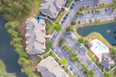 This beautiful Camelia floor plan condo in Crow Creek has a on Crow Creek Golf Club in North Carolina - for sale on GolfHomes.com, golf home, golf lot