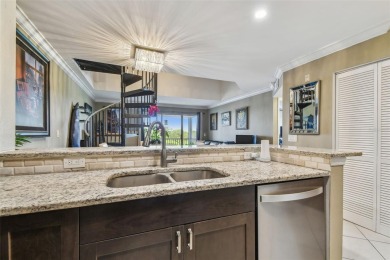 Location, lifestyle, and effortless convenience come together in on Feather Sound Country Club in Florida - for sale on GolfHomes.com, golf home, golf lot