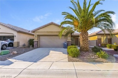 This charming single-story home boasts three bedrooms and is on Stallion Mountain Golf Course in Nevada - for sale on GolfHomes.com, golf home, golf lot