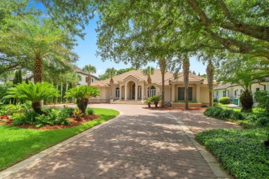 Boating enthusiasts, look no further! Timeless beauty right off on Regatta Bay Golf and Country Club in Florida - for sale on GolfHomes.com, golf home, golf lot