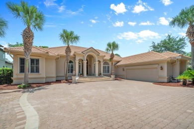Boating enthusiasts, look no further! Timeless beauty right off on Regatta Bay Golf and Country Club in Florida - for sale on GolfHomes.com, golf home, golf lot