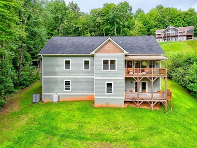 Welcome to this charming one-level home, perfectly situated to on Mountain Harbour Golf Club in North Carolina - for sale on GolfHomes.com, golf home, golf lot