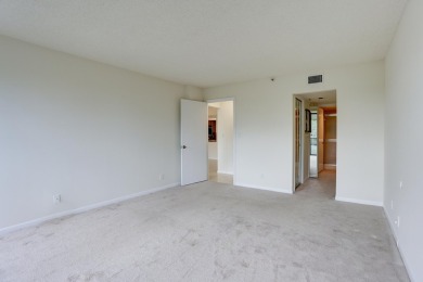 4th FLOOR CONDO WITH SOUTH EXPOSURE OFF THE SCREENED BALCONY on The Country Club At Boca Raton in Florida - for sale on GolfHomes.com, golf home, golf lot