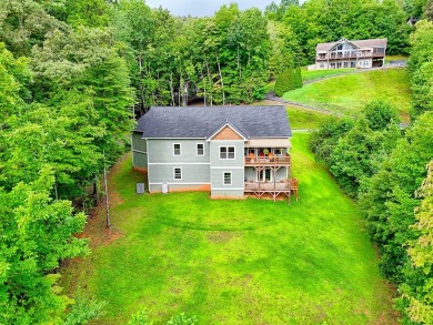 Welcome to this charming one-level home, perfectly situated to on Mountain Harbour Golf Club in North Carolina - for sale on GolfHomes.com, golf home, golf lot