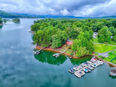 Welcome to this charming one-level home, perfectly situated to on Mountain Harbour Golf Club in North Carolina - for sale on GolfHomes.com, golf home, golf lot