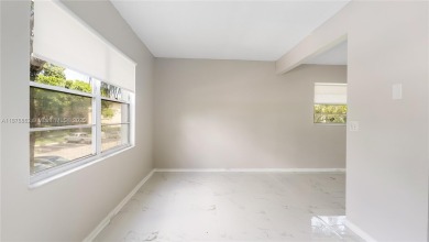 Beautifully upgraded 2BR/2BA corner unit in Century Village, a on Flamingo Lakes Country Club in Florida - for sale on GolfHomes.com, golf home, golf lot